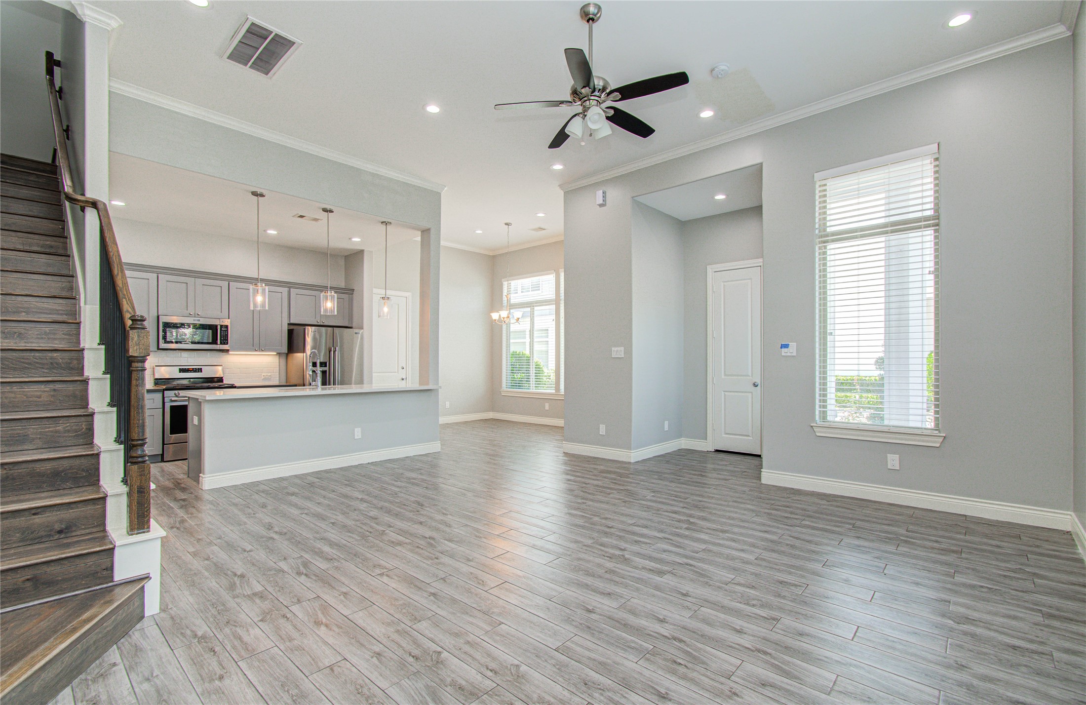 8903 Spring Knoll Forest Drive Houston, TX 77080 - Photo 19 of 29 a view of kitchen with wooden floor and window