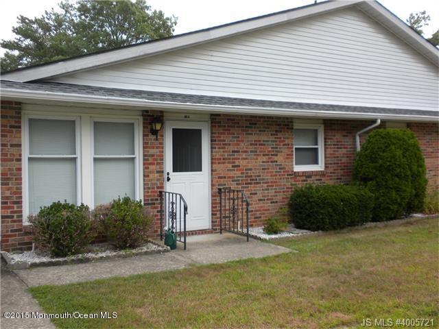 20 D Sycamore Access Road, Unit 4A Manahawkin, NJ 08050 - Photo 1 of 21 a front view of a house with a garden