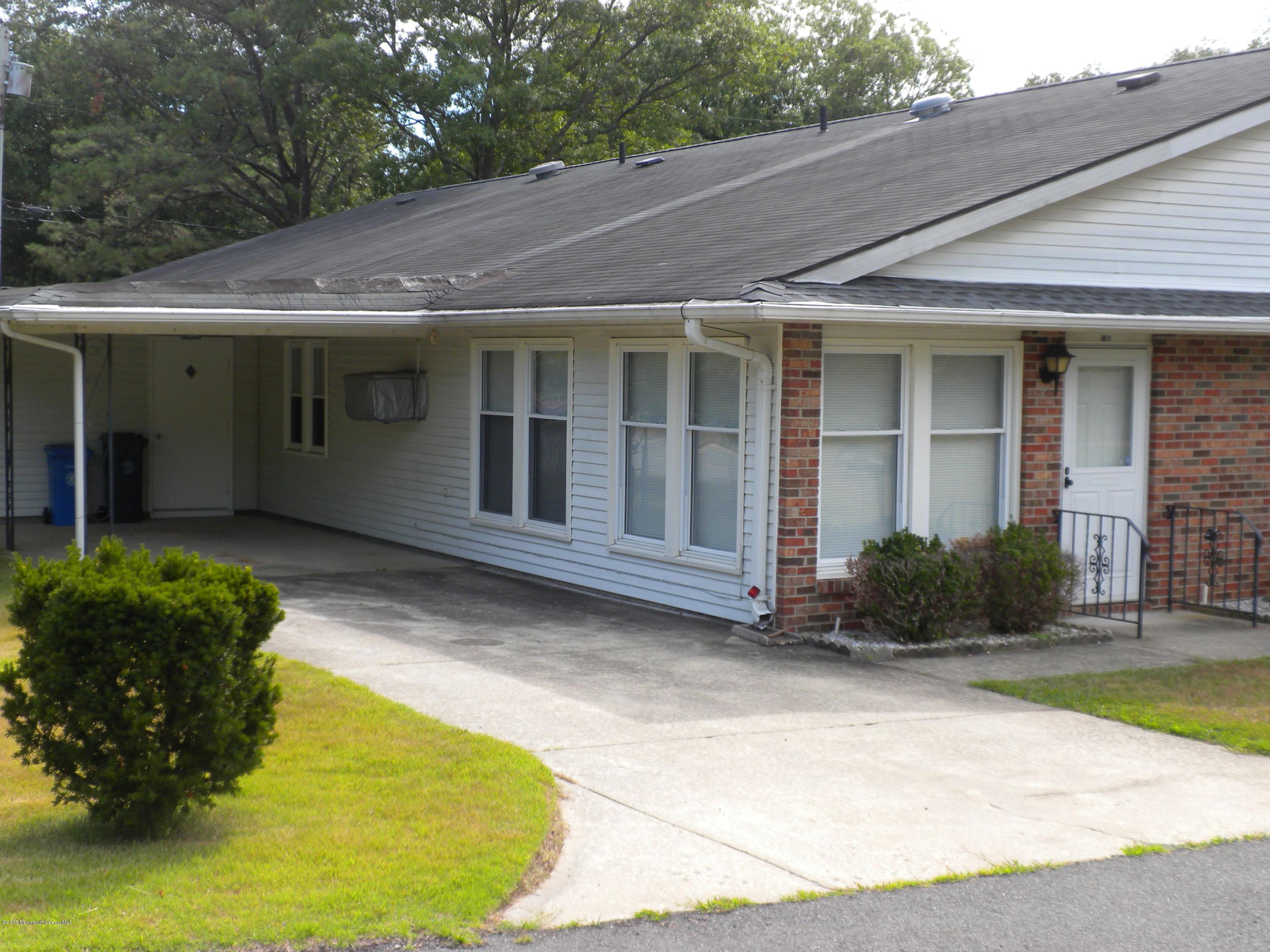 20 D Sycamore Access Road, Unit 4A Manahawkin, NJ 08050 - Photo 17 of 21 a view of a house with backyard