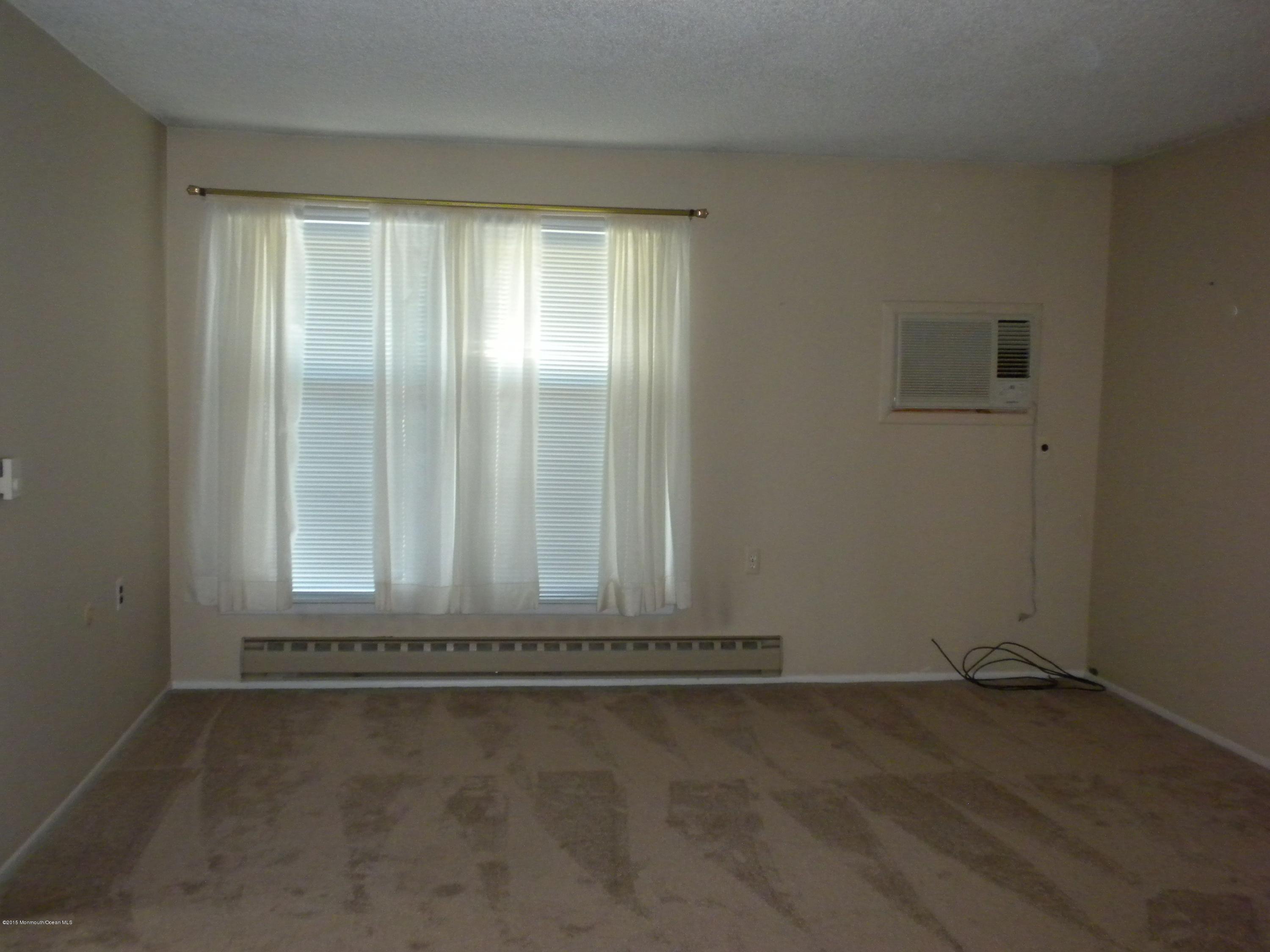 20 D Sycamore Access Road, Unit 4A Manahawkin, NJ 08050 - Photo 20 of 21 an empty room with a empty space