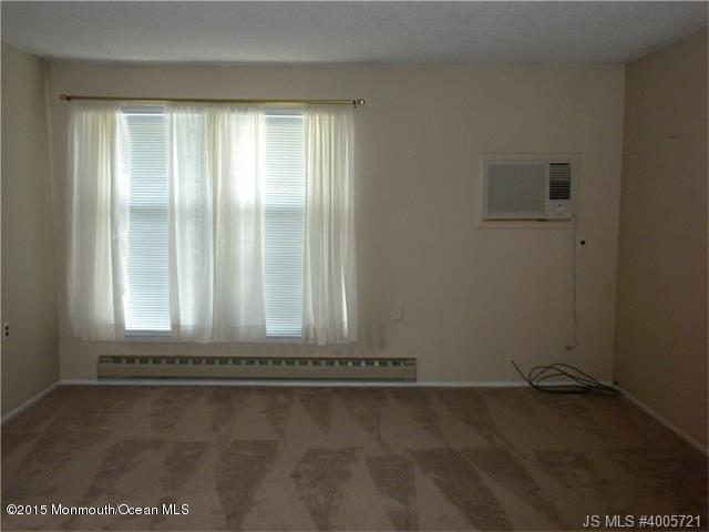 20 D Sycamore Access Road, Unit 4A Manahawkin, NJ 08050 - Photo 2 of 21 an empty room with a window
