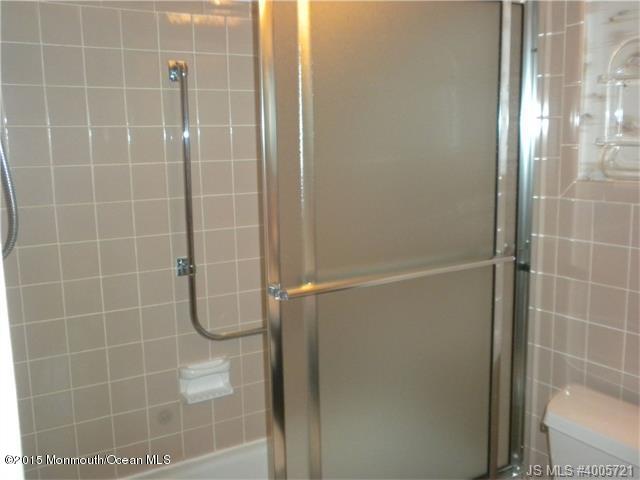 20 D Sycamore Access Road, Unit 4A Manahawkin, NJ 08050 - Photo 7 of 21 a bathroom with a shower