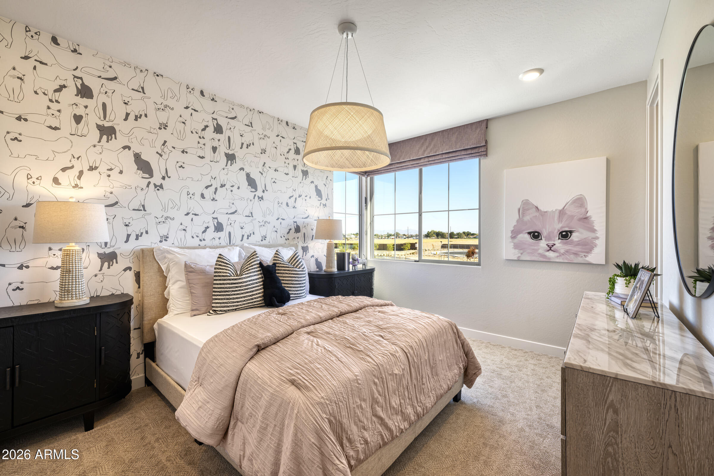 5729 South Quartz Street Gilbert, AZ 85298 - Photo 13 of 20 a bed room with a bed and a painting on the wall