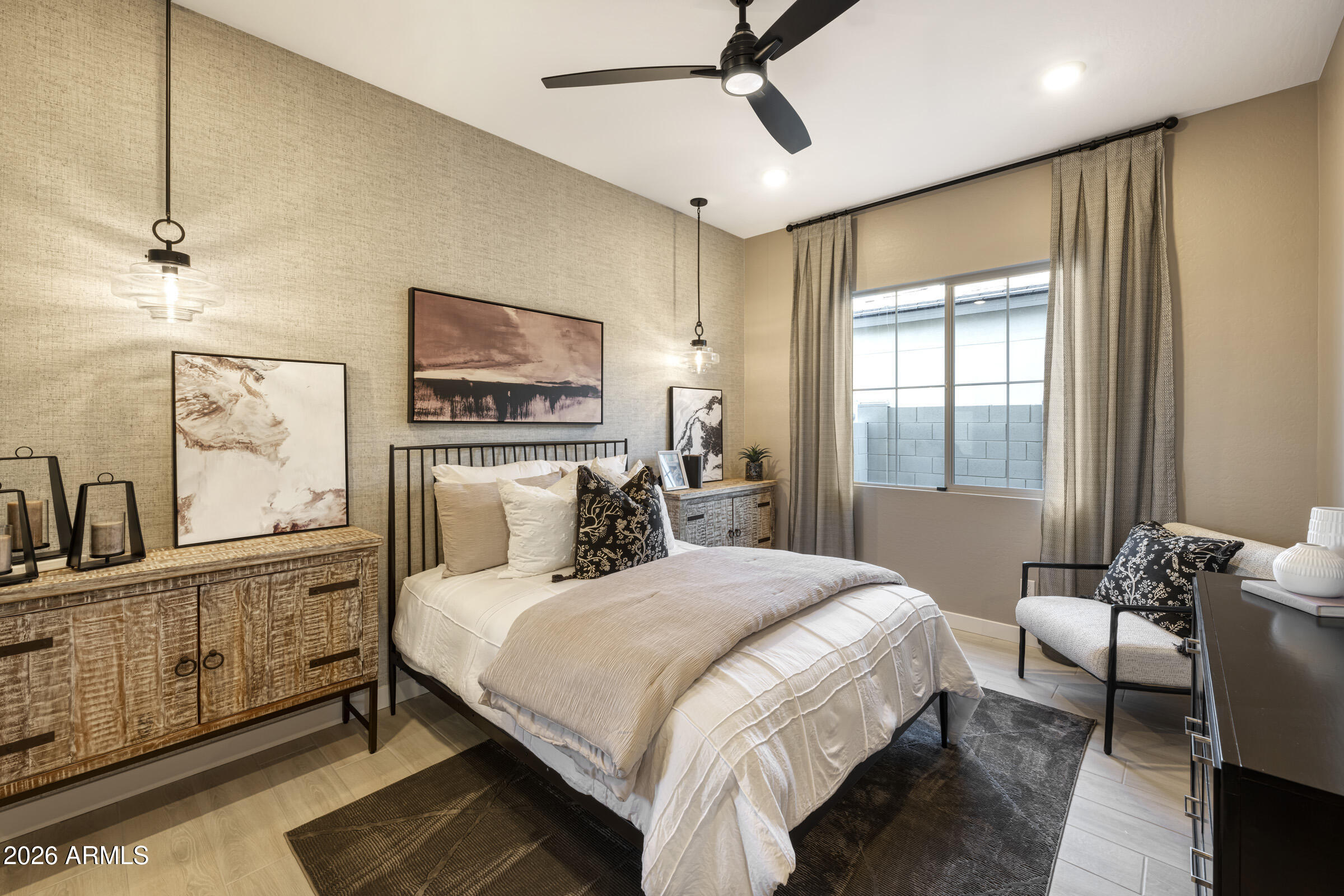 5729 South Quartz Street Gilbert, AZ 85298 - Photo 15 of 20 a bedroom with a bed and wooden floor