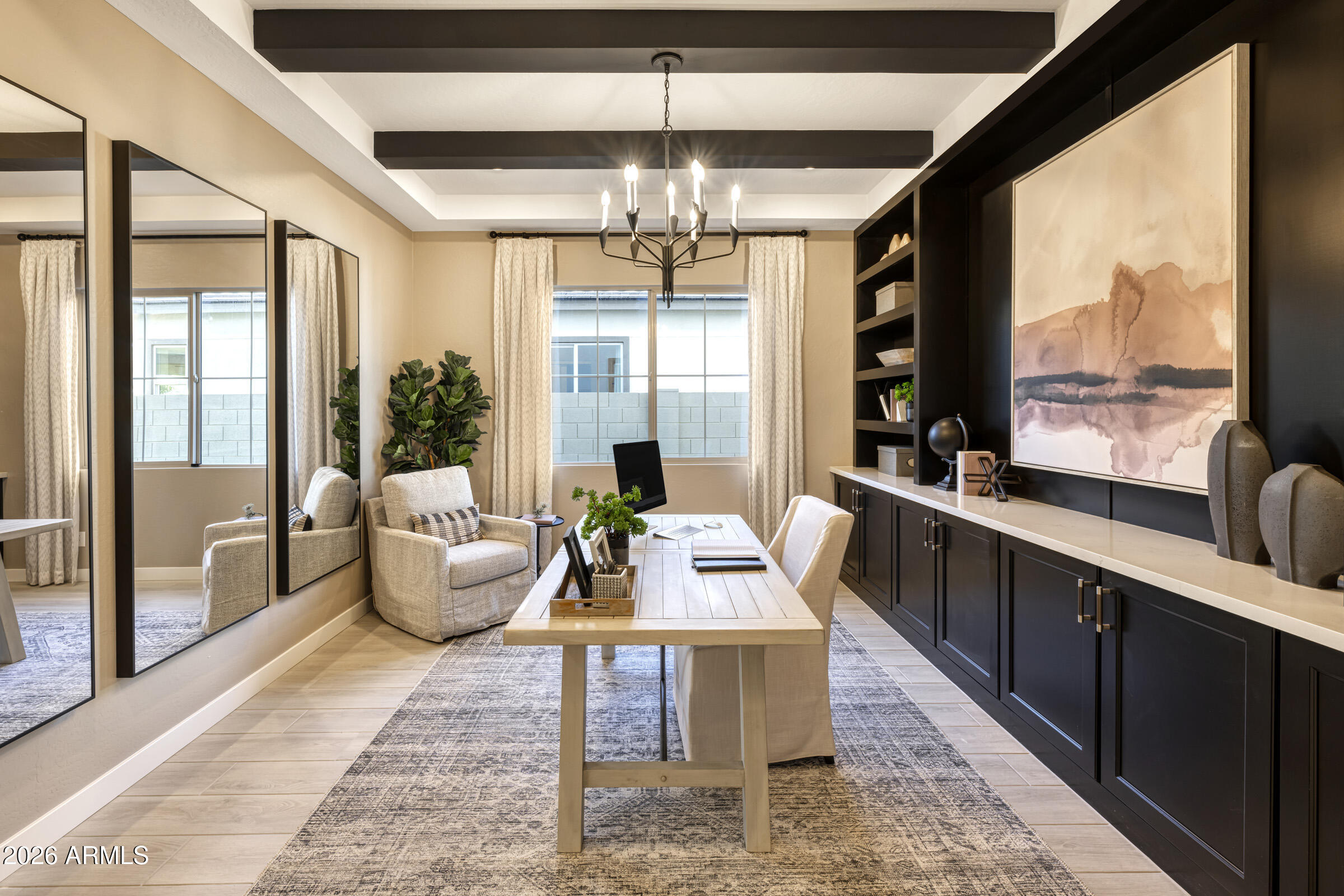 5729 South Quartz Street Gilbert, AZ 85298 - Photo 16 of 20 a large living room with large windows and furniture