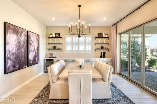 a view of a dining room with furniture window and outside view