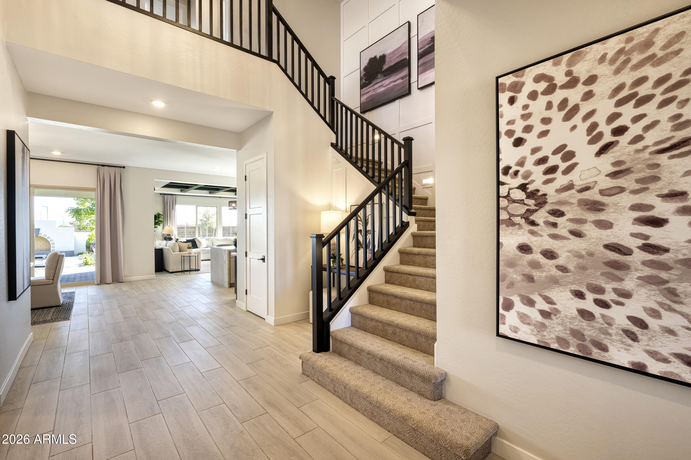 5729 South Quartz Street Gilbert, AZ 85298 - Photo 9 of 20 a view of entryway and hall with wooden floor