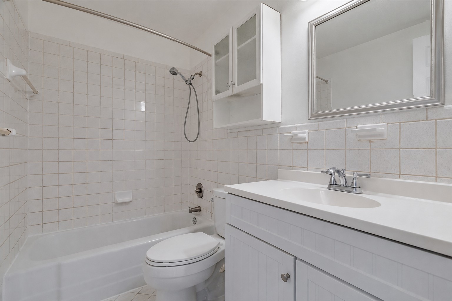 1417 Braes Ridge Drive, Unit B Austin, TX 78723 - Photo 19 of 22 a bathroom with a sink a toilet and a bathtub