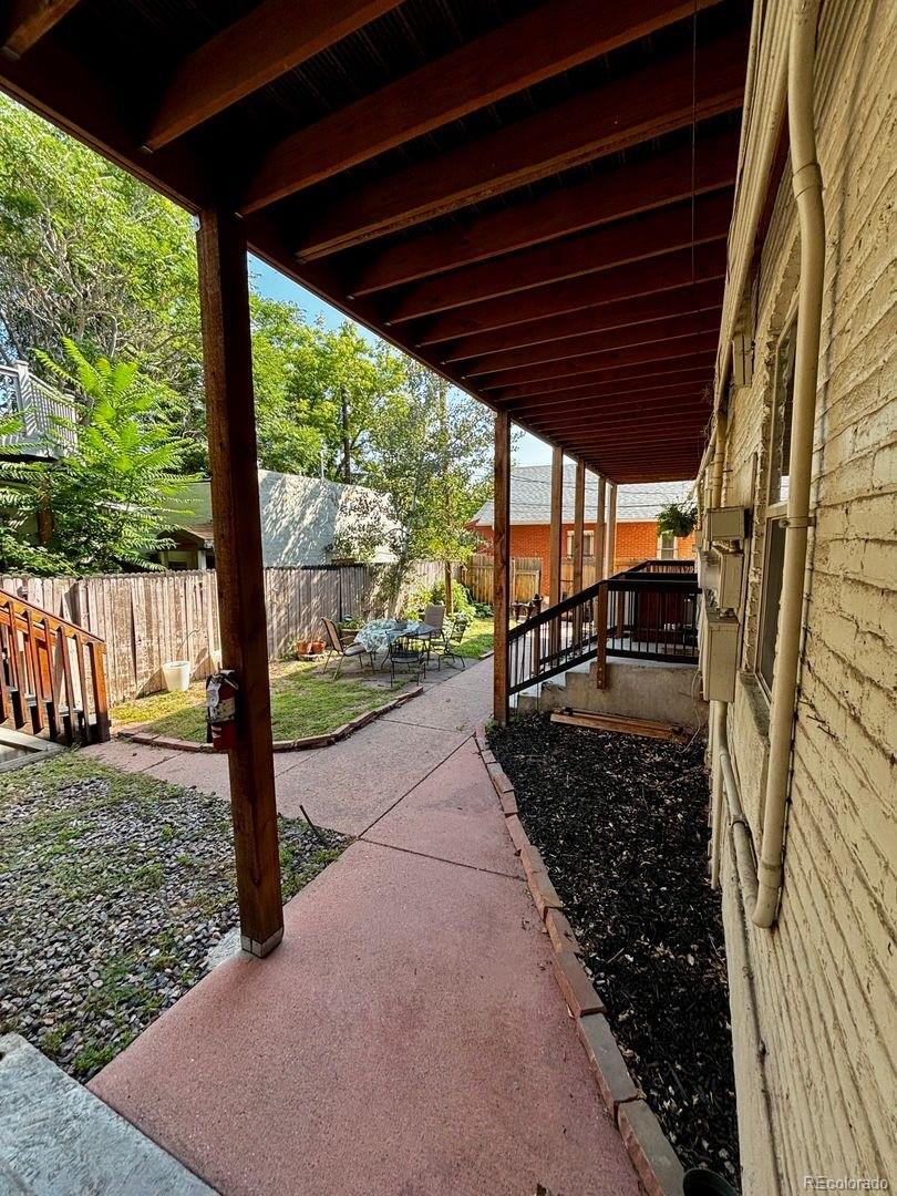 3127 West 28th Avenue, Unit 7 Denver, CO 80211 - Photo 9 of 11 a view of a porch