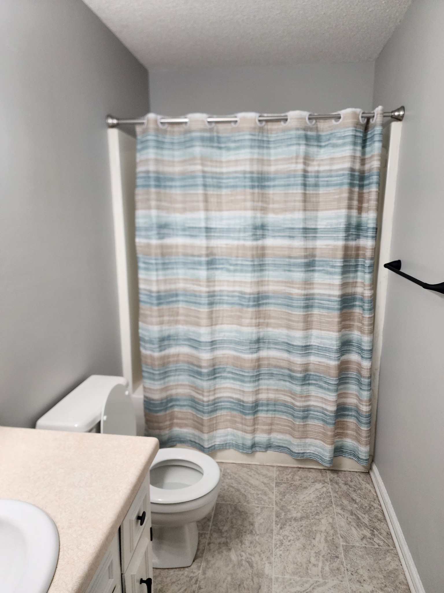 105 Helen Street, Unit B Tullahoma, TN 37388 - Photo 9 of 10 a bathroom with a sink and a toilet