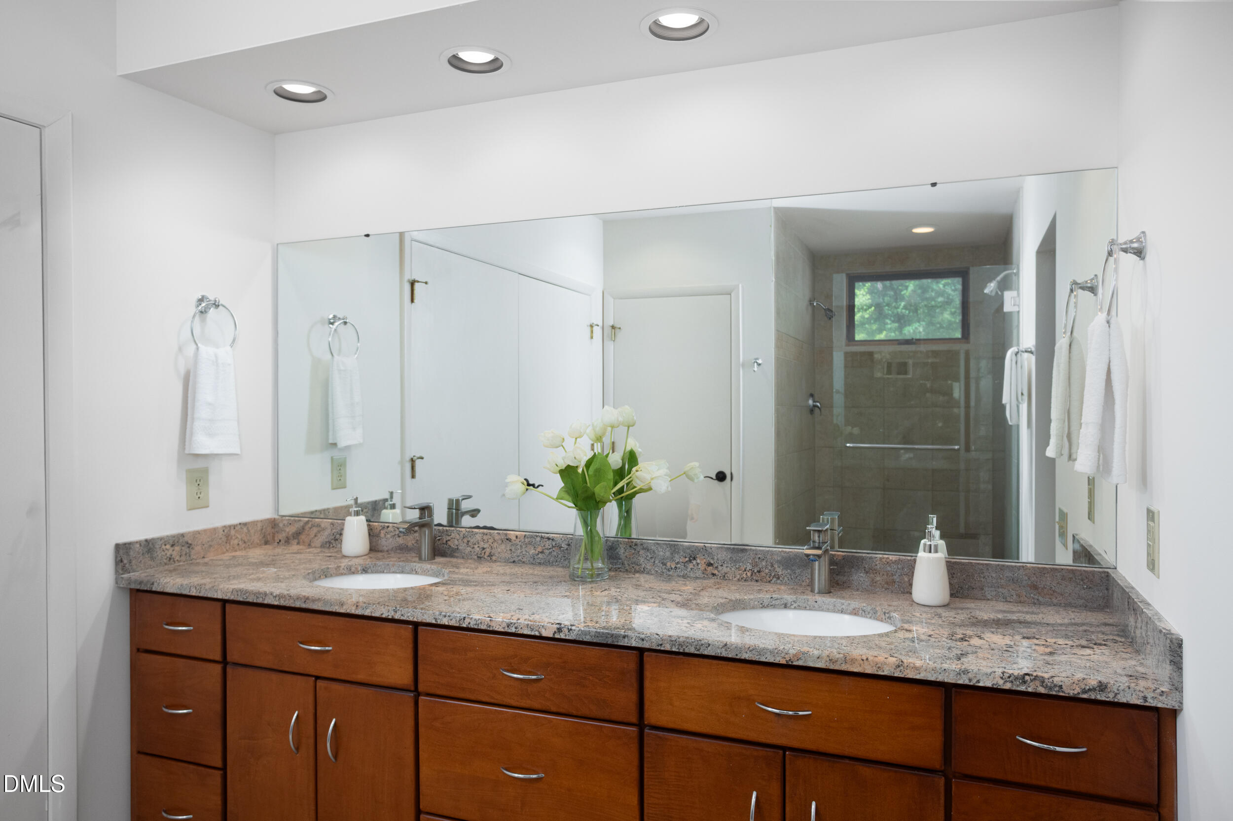 260 Bc Way Rougemont, NC 27572 - Photo 41 of 76 a bathroom with a granite countertop sink and a mirror
