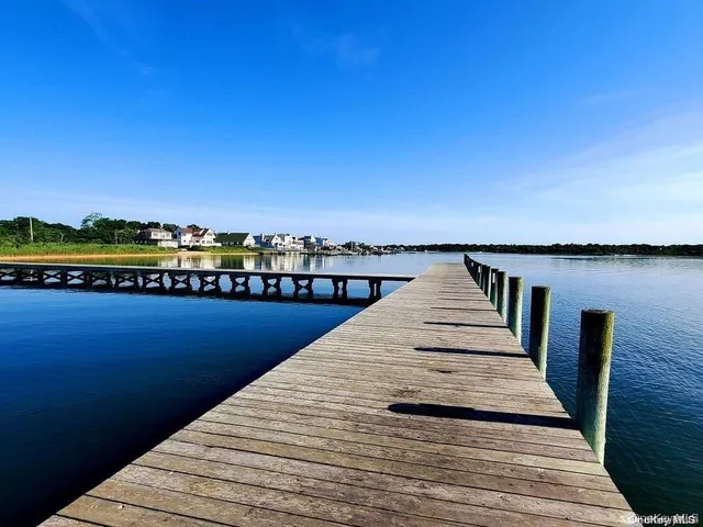 a view of wooden floor with a lake