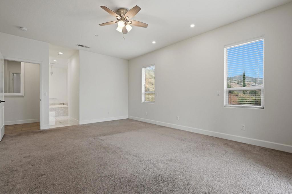1910 Harbison Canyon Road El Cajon, CA 92019 - Photo 23 of 71 a view of an empty room with a window