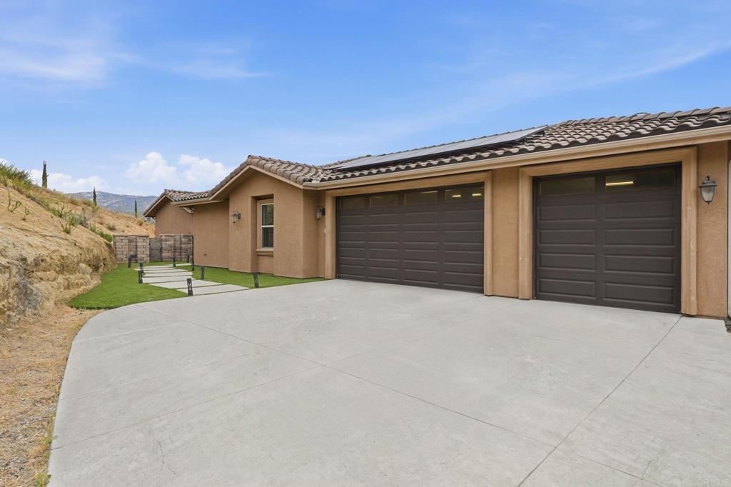 1910 Harbison Canyon Road El Cajon, CA 92019 - Photo 3 of 71 a house with a outdoor space