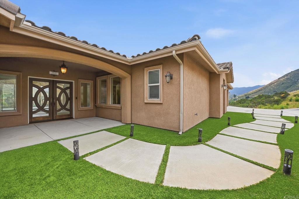1910 Harbison Canyon Road El Cajon, CA 92019 - Photo 4 of 71 a view of a house with a yard