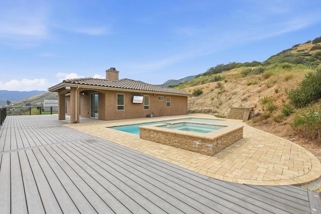 1910 Harbison Canyon Road El Cajon, CA 92019 - Photo 54 of 71 a front view of a house with a yard