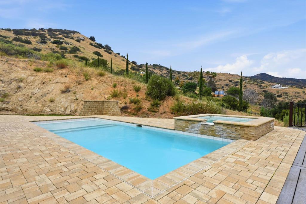 1910 Harbison Canyon Road El Cajon, CA 92019 - Photo 59 of 71 a view of swimming pool with a yard