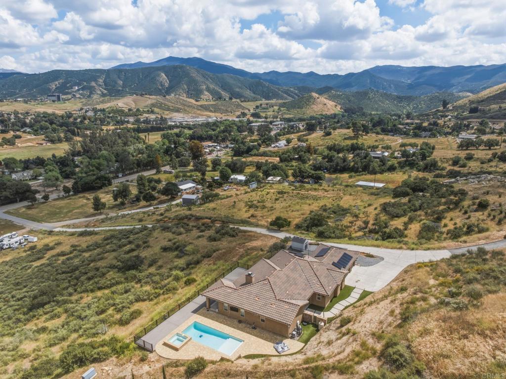 1910 Harbison Canyon Road El Cajon, CA 92019 - Photo 65 of 71 an aerial view of residential houses with outdoor space
