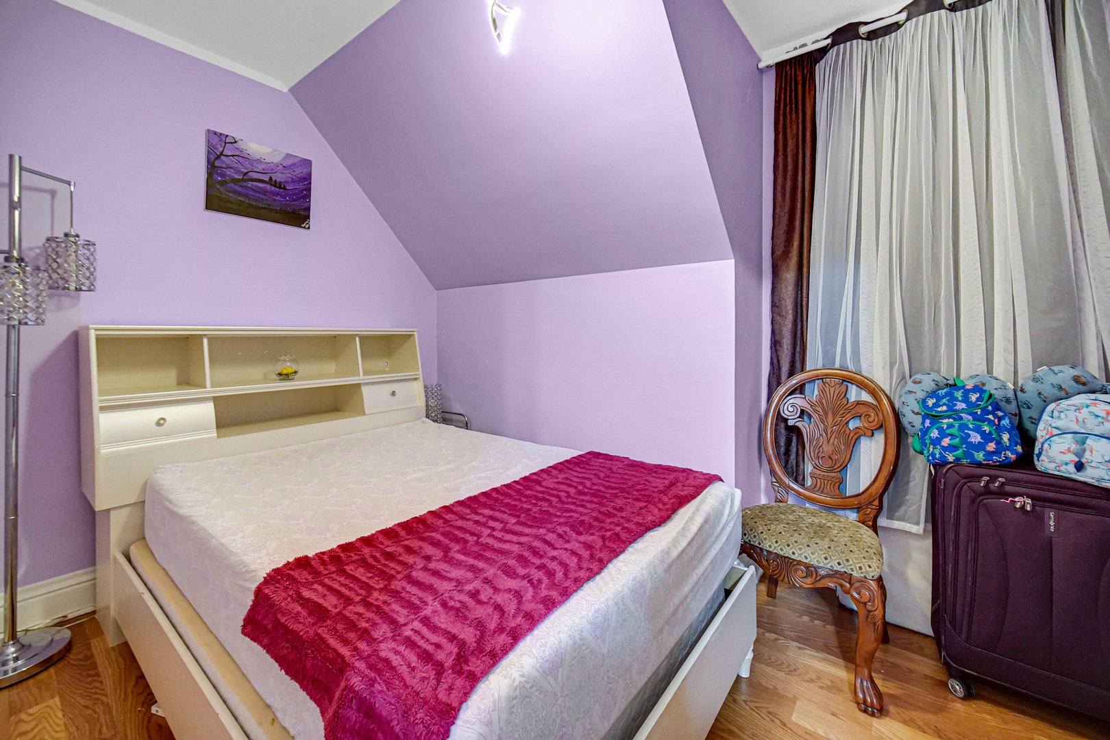 Undisclosed Address Chicago, IL 60641 - Photo 11 of 18 a bed room with a bed and a chair