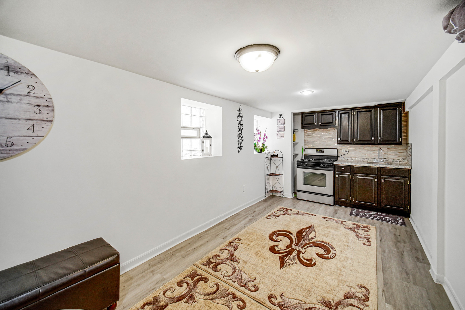 Undisclosed Address Chicago, IL 60641 - Photo 13 of 18 a kitchen with a sink appliances and cabinets