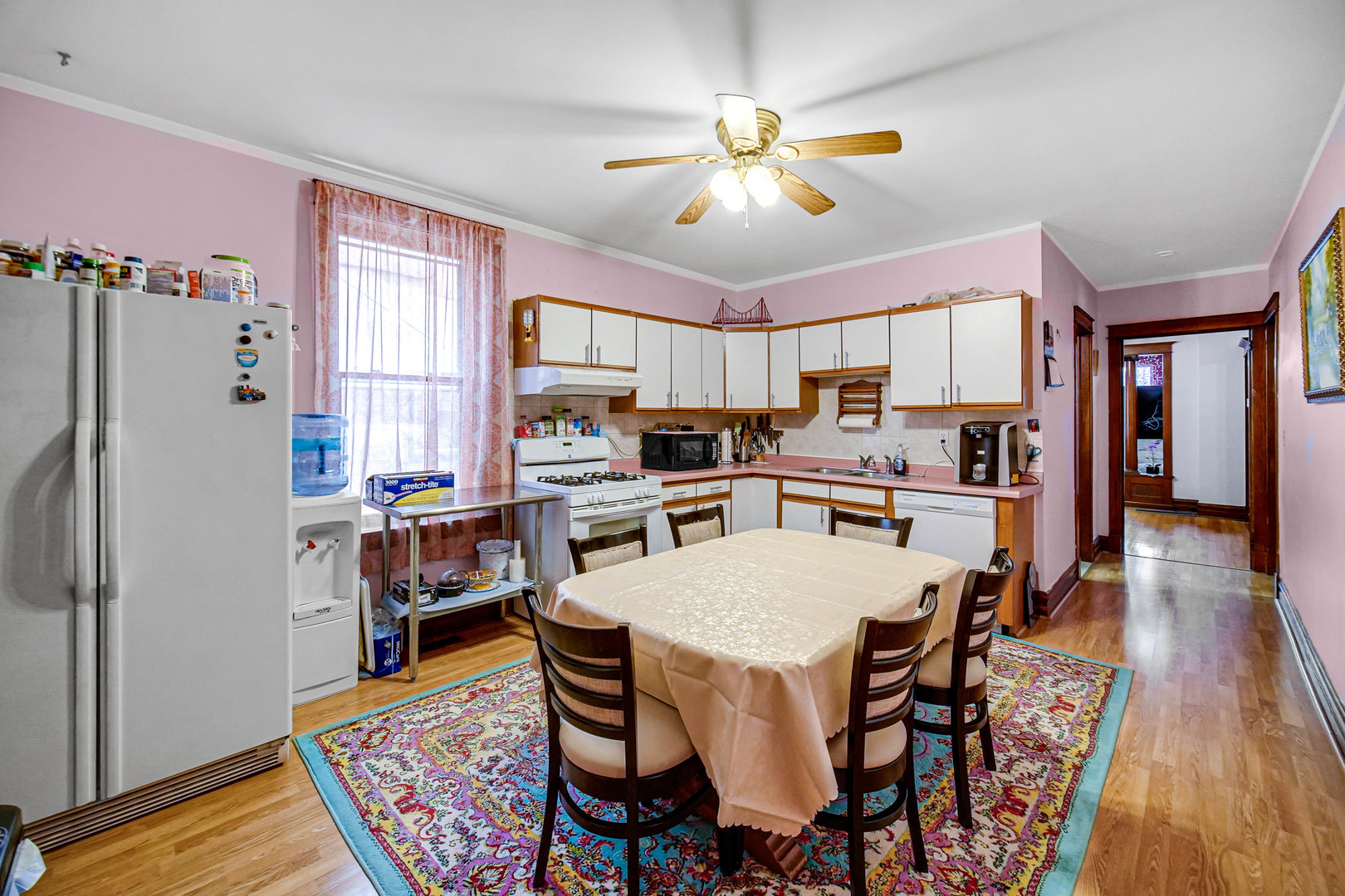 Undisclosed Address Chicago, IL 60641 - Photo 5 of 18 a view of a dining room with furniture window and wooden floor