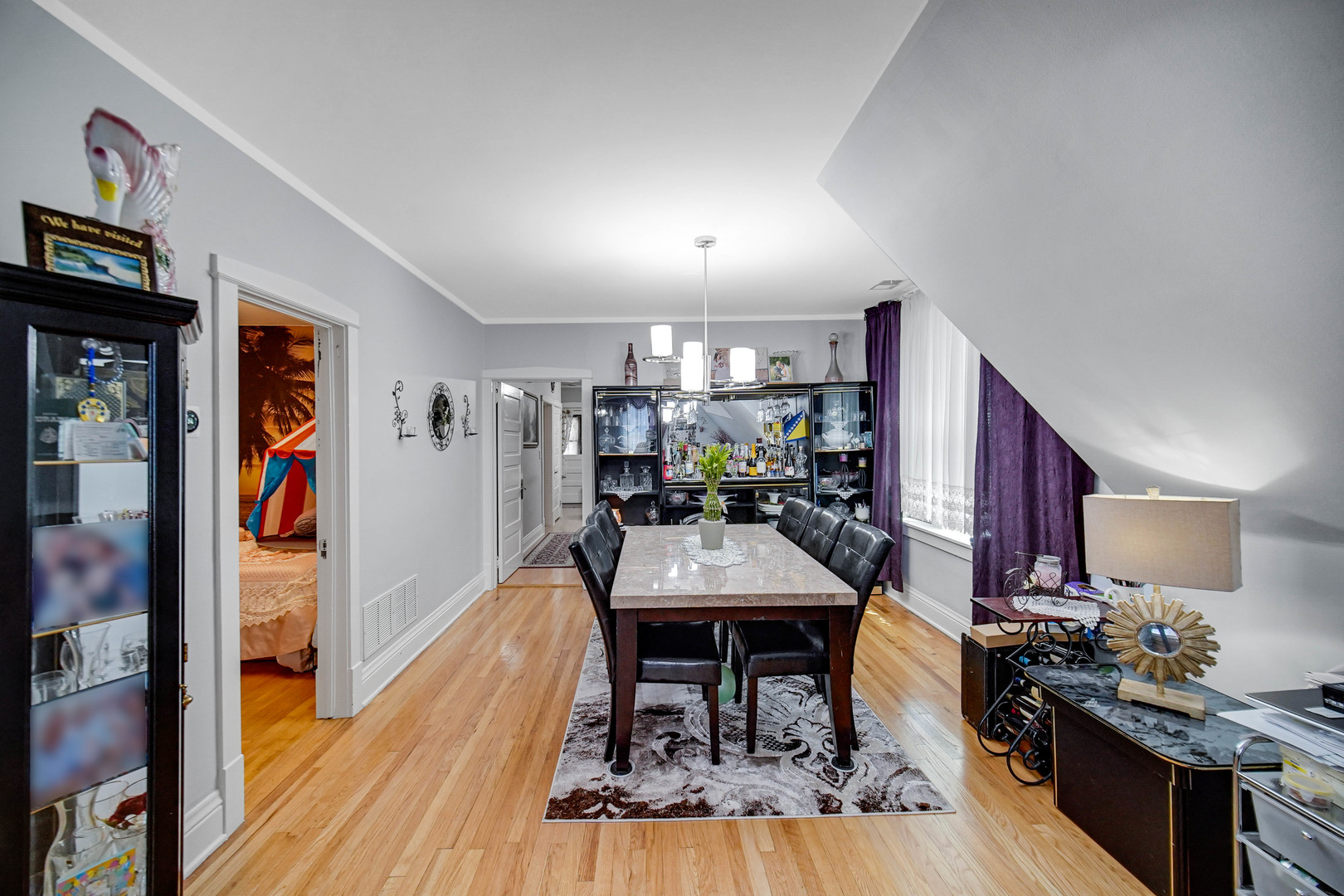 Undisclosed Address Chicago, IL 60641 - Photo 8 of 18 a view of a dining room with furniture