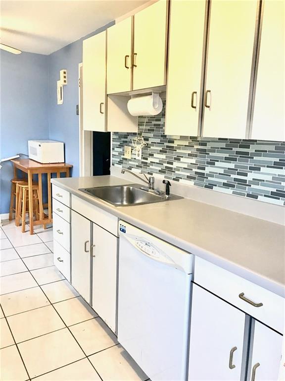 215 Seaton Road, Unit 2 Stamford, CT 06902 - Photo 1 of 1 a kitchen with stainless steel appliances a sink and a stove