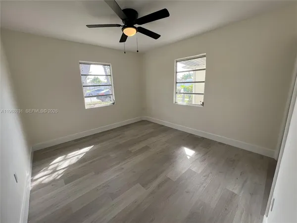 a view of an empty room and window
