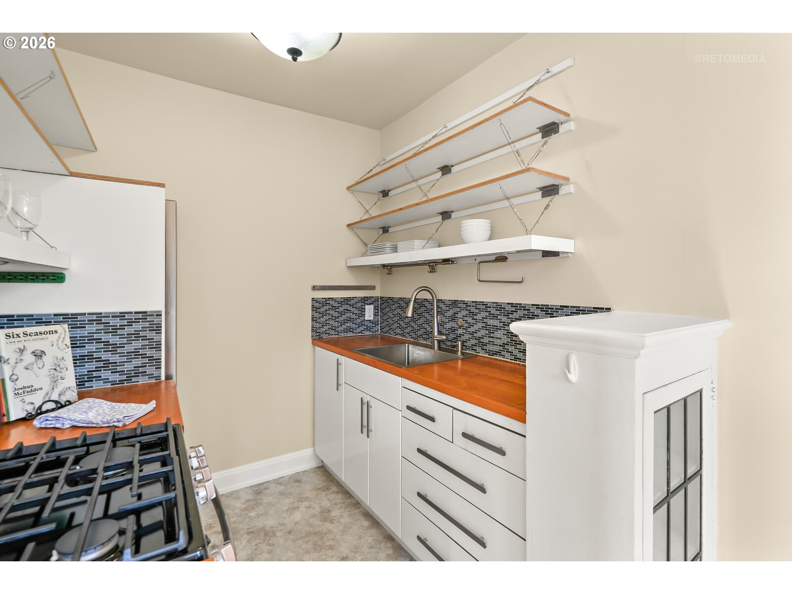 709 Southwest 16th Avenue, Unit 308 Portland, OR 97205 - Photo 14 of 22 a kitchen view of a stove