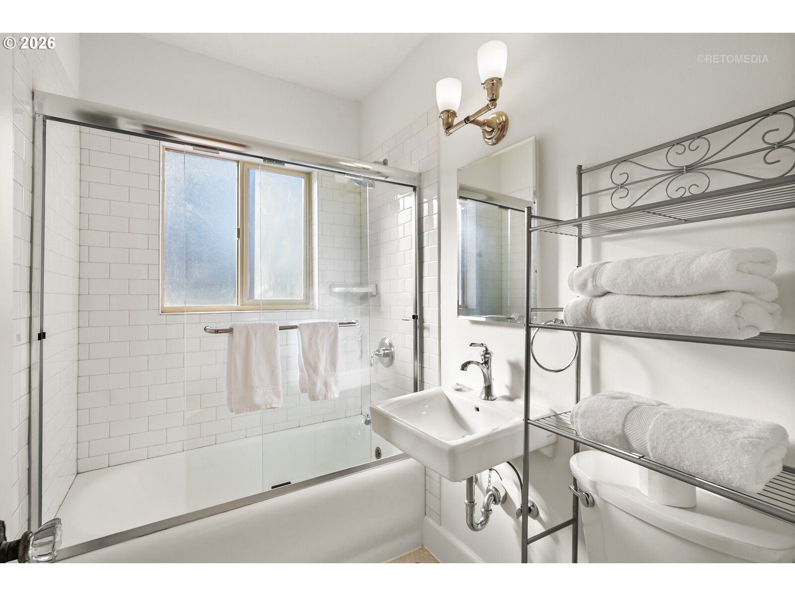 709 Southwest 16th Avenue, Unit 308 Portland, OR 97205 - Photo 16 of 22 a living room with furniture and a large window