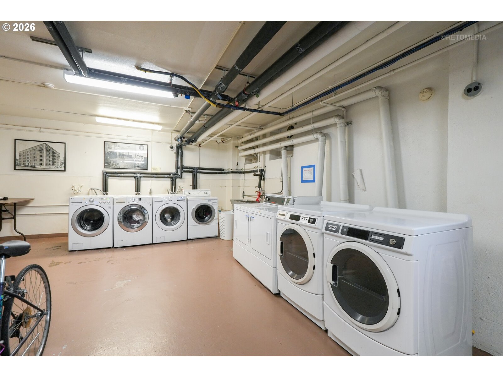 709 Southwest 16th Avenue, Unit 308 Portland, OR 97205 - Photo 18 of 22 a utility room with dryer and washer