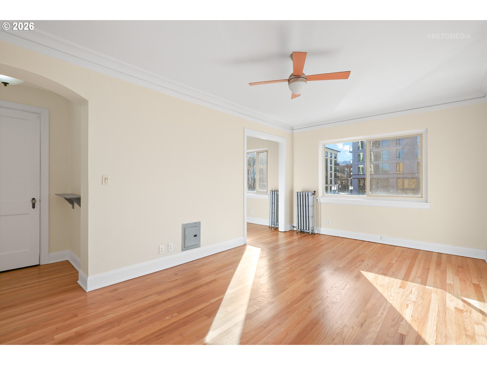 709 Southwest 16th Avenue, Unit 308 Portland, OR 97205 - Photo 9 of 22 a view interior of a house with wooden floor and windows