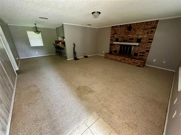 a view of a livingroom with a fireplace