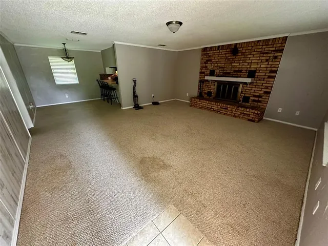 a view of a livingroom with a fireplace