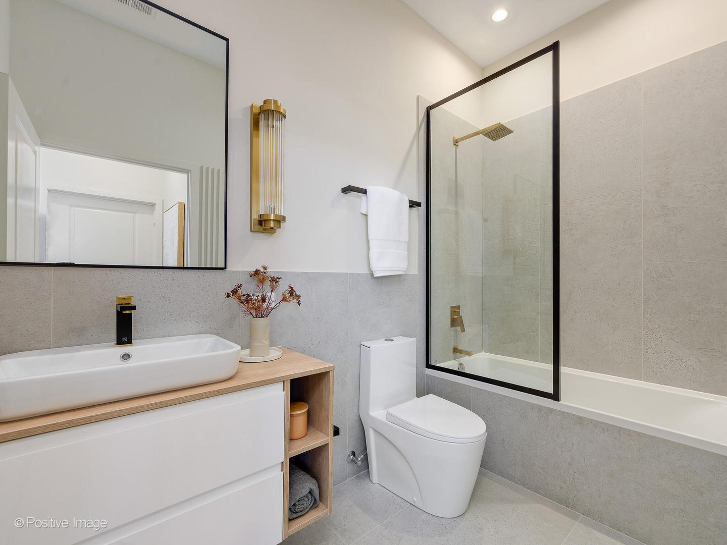 11 West Prospect Avenue, Unit 510 Mount Prospect, IL 60056 - Photo 13 of 67 a bathroom with a sink a toilet and shower