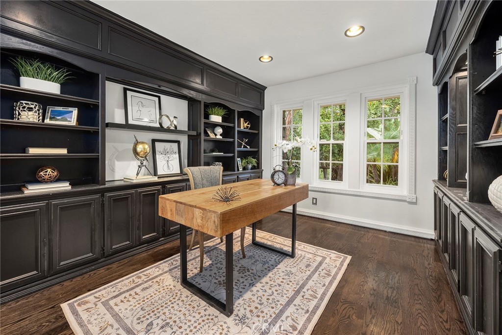 6641 East Canyon Hills Road Anaheim Hills, CA 92807 - Photo 13 of 44 a living room with furniture a rug kitchen view and large windows
