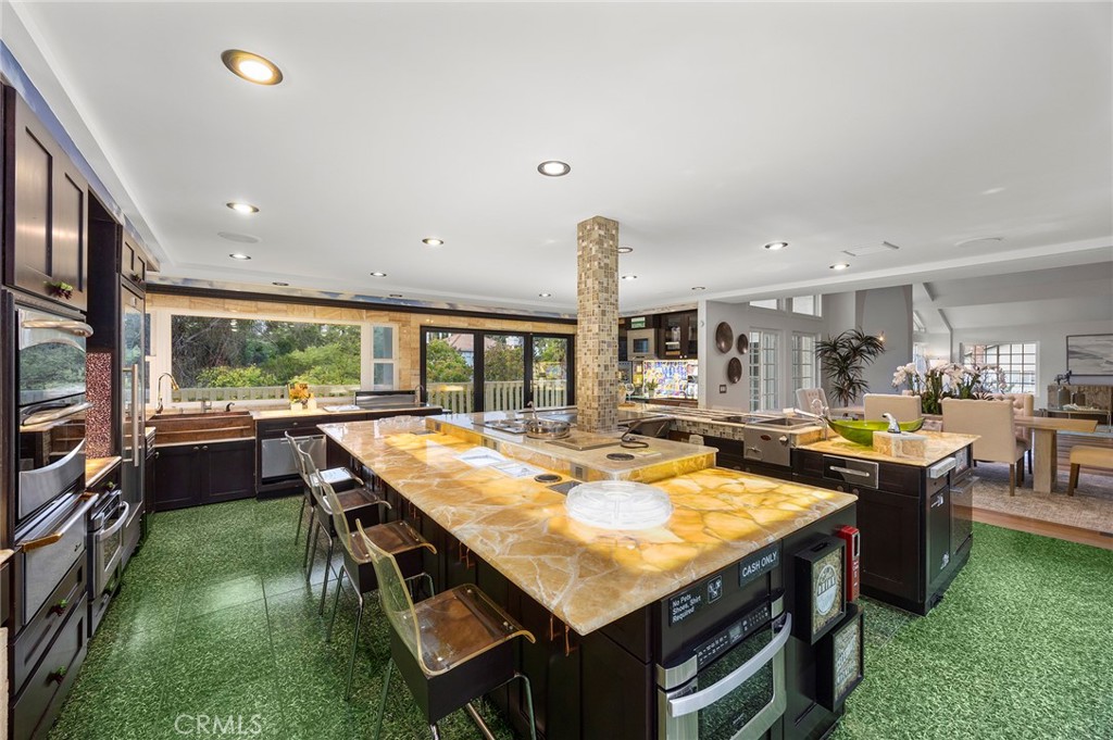 6641 East Canyon Hills Road Anaheim Hills, CA 92807 - Photo 19 of 44 a room with pool table and chairs