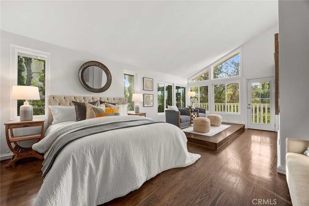 6641 East Canyon Hills Road Anaheim Hills, CA 92807 - Photo 24 of 44 a bedroom with bed and wooden floor