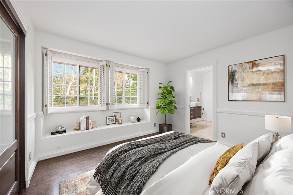 6641 East Canyon Hills Road Anaheim Hills, CA 92807 - Photo 32 of 44 a bedroom with a bed and a large window