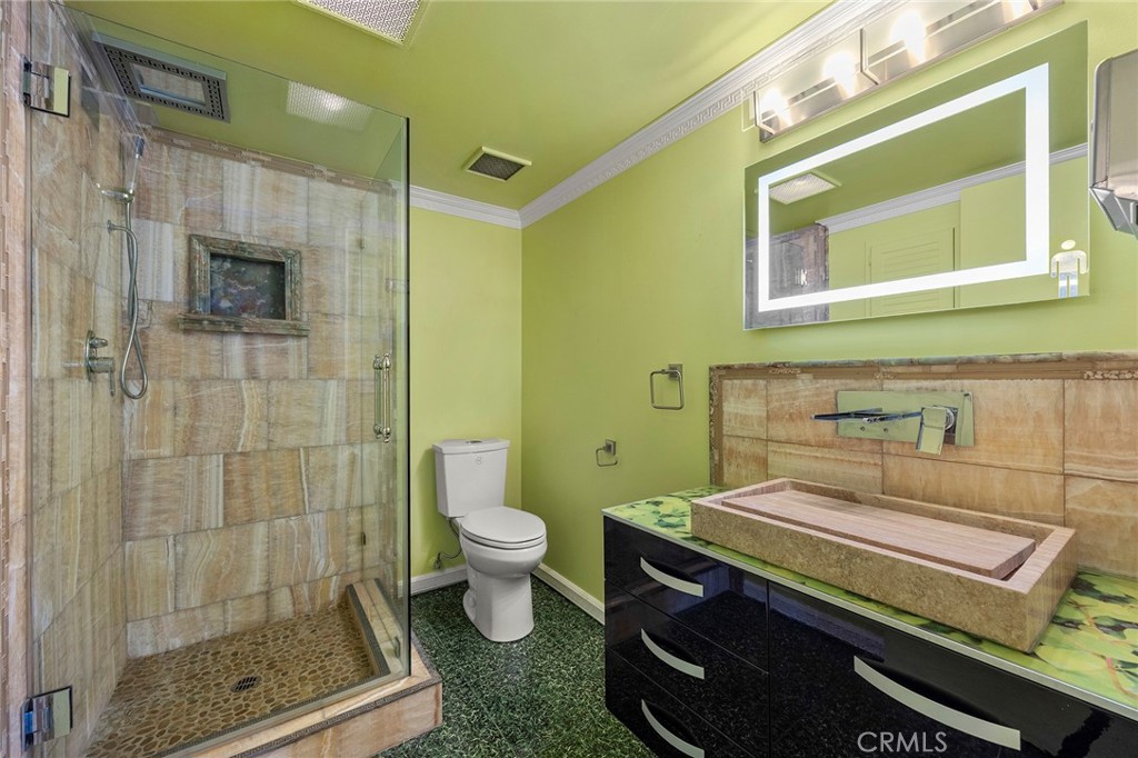 6641 East Canyon Hills Road Anaheim Hills, CA 92807 - Photo 34 of 44 a bathroom with a sink a toilet and shower