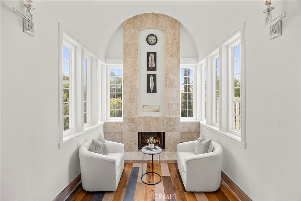 6641 East Canyon Hills Road Anaheim Hills, CA 92807 - Photo 10 of 44 a living room with furniture and a fireplace