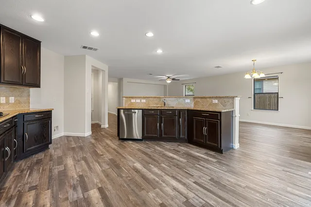 a view of a storage & utility room with washer and dryer