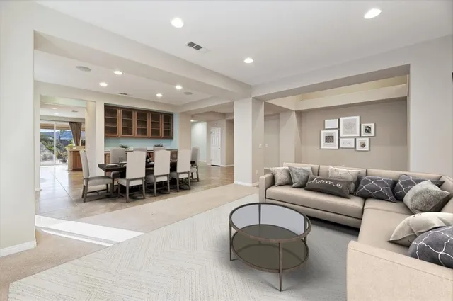 a view of a kitchen with a sink and a window