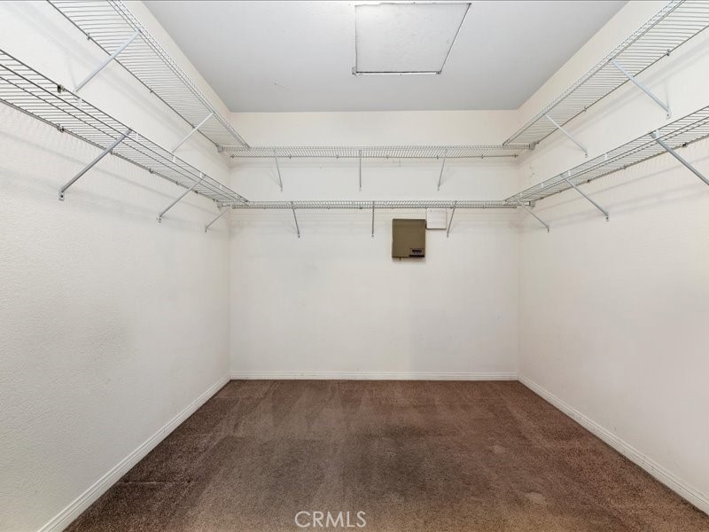 19069 Eldorado Road Perris, CA 92570 - Photo 33 of 49 a view of a room with racks on the wall