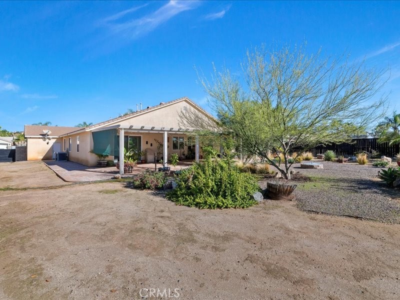 19069 Eldorado Road Perris, CA 92570 - Photo 42 of 49 a view of a house with backyard and sitting area