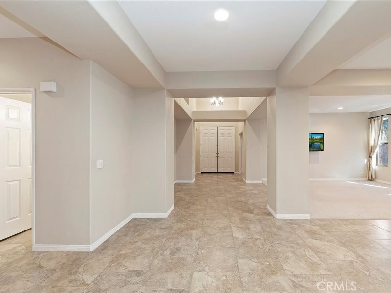 19069 Eldorado Road Perris, CA 92570 - Photo 7 of 49 an empty room with a natural light