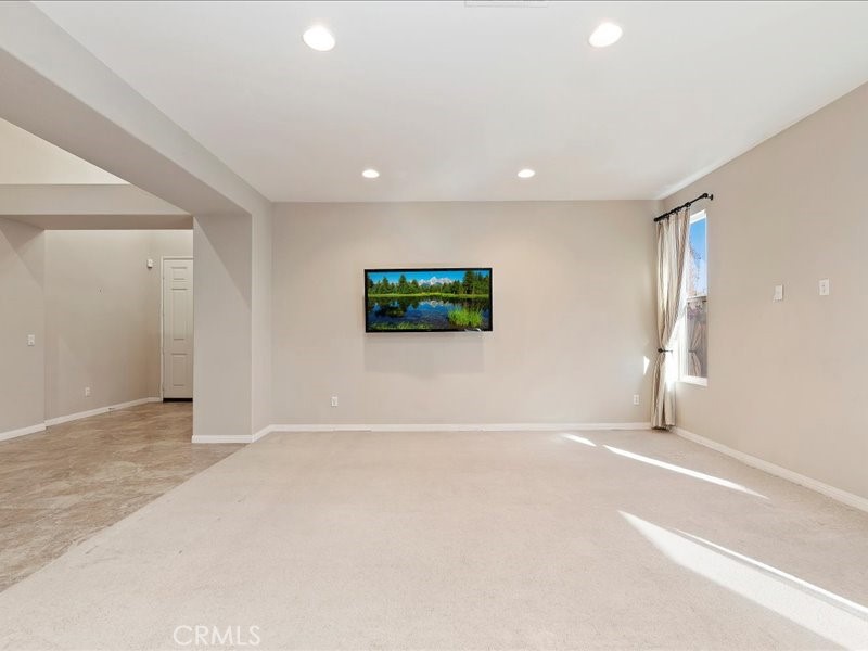 19069 Eldorado Road Perris, CA 92570 - Photo 8 of 49 an empty room with windows