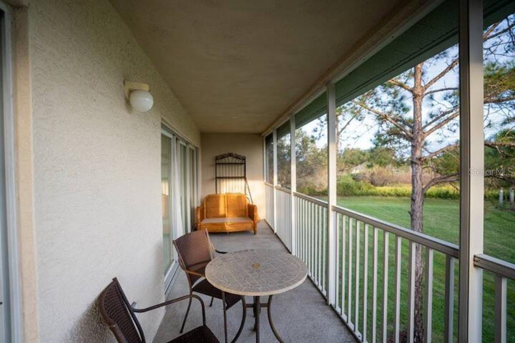 7189 Strand Circle, Unit 1 Bradenton, FL 34203 - Photo 11 of 19 a view of balcony and patio