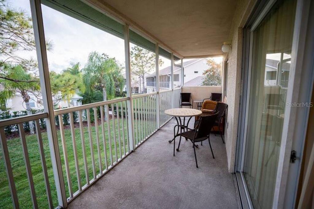 7189 Strand Circle, Unit 1 Bradenton, FL 34203 - Photo 12 of 19 a view of a two chair in the balcony