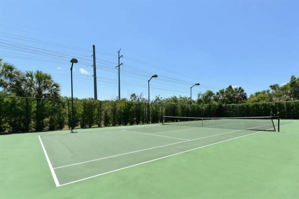 7189 Strand Circle, Unit 1 Bradenton, FL 34203 - Photo 16 of 19 a view of a tennis court